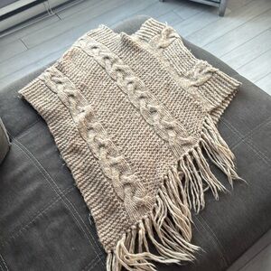 Poncho with fringe details